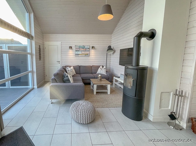 Wohnzimmer mit Ofen Ferienhaus Schnberg (Holstein) / Holm