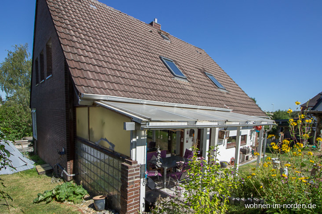 Ansicht mit berdachter Terrasse Einfamilienhaus Kiel / Elmschenhagen