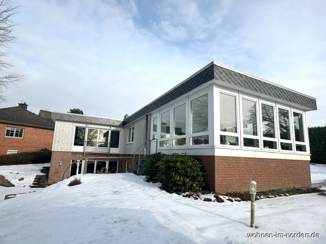 seitlicher Blick mit Wintergarten Einfamilienhaus Molfsee