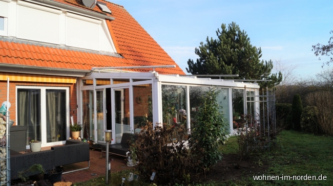 Gartenbereich mit Blick auf den Wintergarten Einfamilienhaus Bad Bramstedt