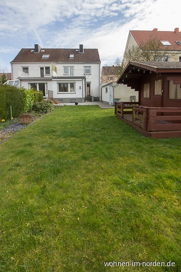 Blick vom Garten auf das Haus Einfamilienhaus Kiel / Ellerbek